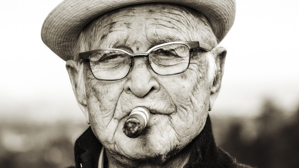 Norman Lear smoking cigar