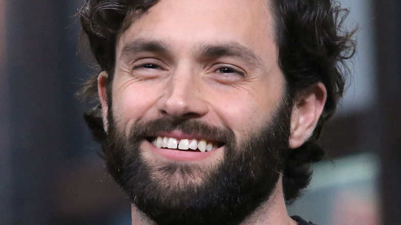 Penn Badgley laughing