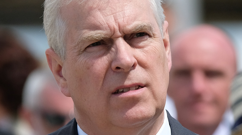 Prince Andrew looking up