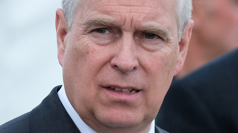 Prince Andrew looking away