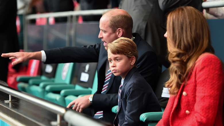 Prince George with his parents 
