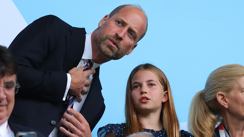 Prince William and Princess Charlotte talking