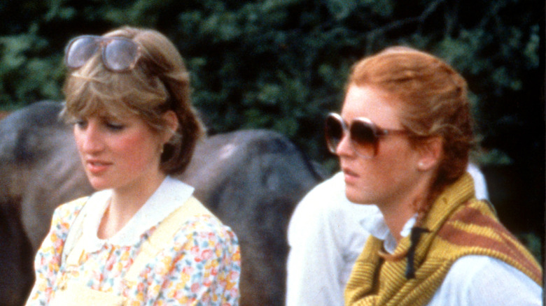 Princess Diana and Sarah Ferguson outside with horses