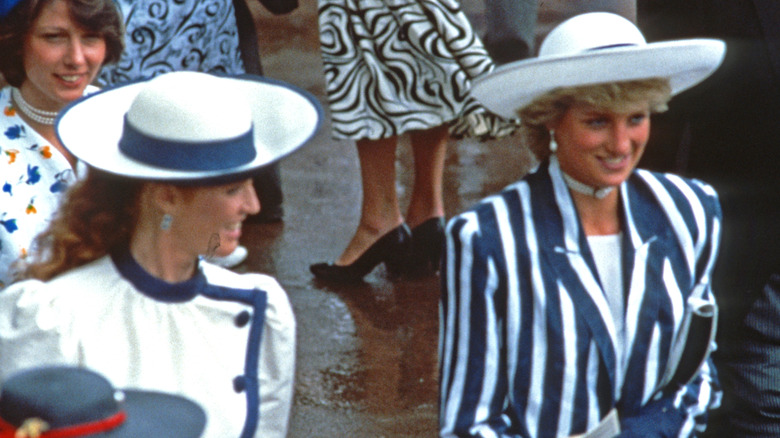 Sarah Ferguson and Princess Diana wearing blue and white outfits