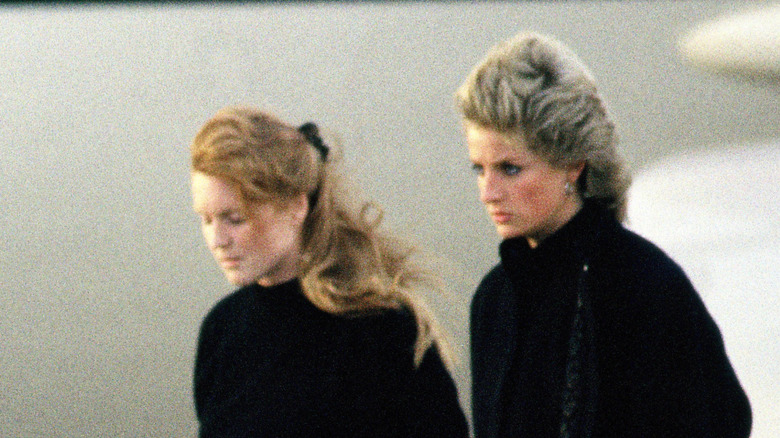Sarah Ferguson and Princess Diana stepping off a plane