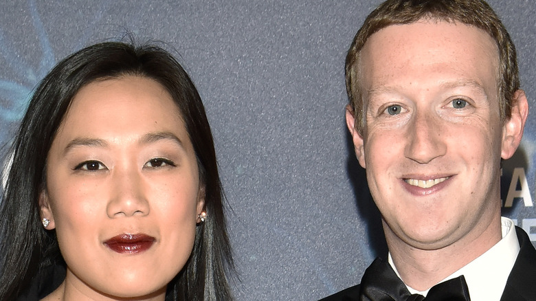 Priscilla Chan and Mark Zuckerberg attending an event