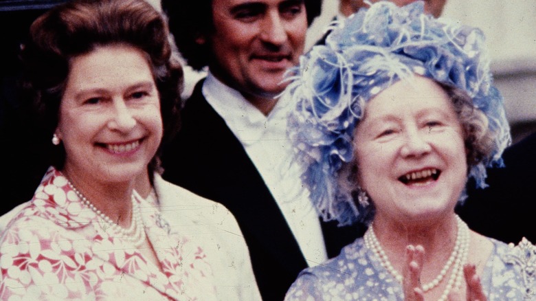 Queen Elizabethn is seen with her late mother in a fancy blue hat