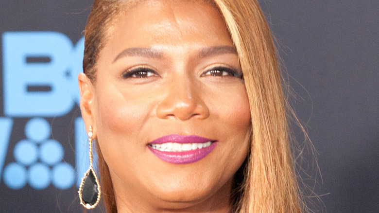 Queen Latifa smiling