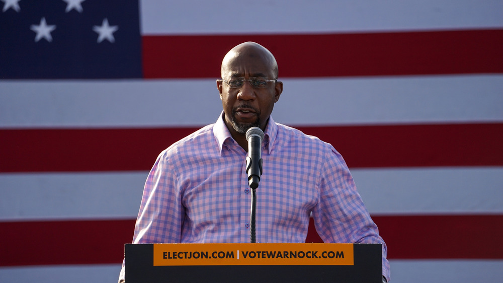 Democratic candidate Raphael Warnock in glasses