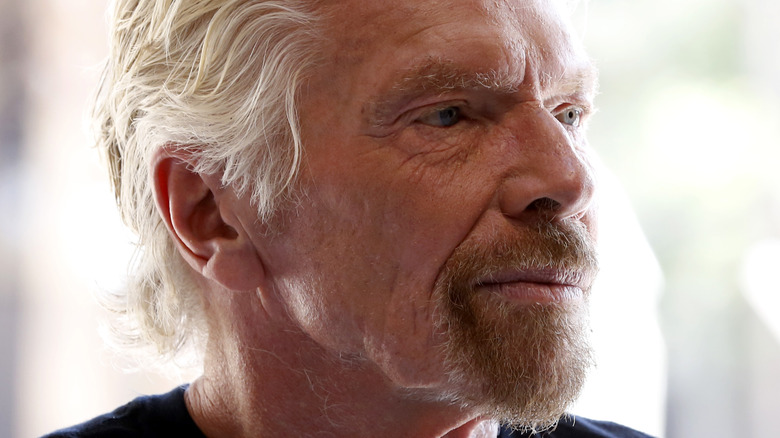 Richard Branson looking off to the side