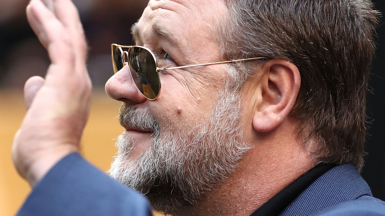 Russell Crowe smiles with beard