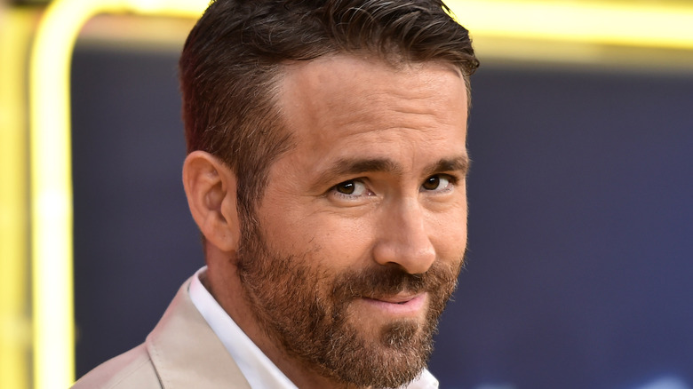 Ryan Reynolds poses at an event