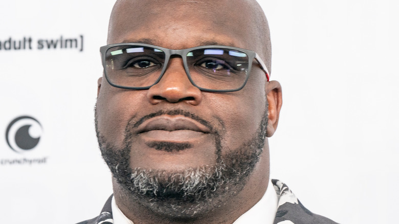 Shaquille O'Neal posing in sunglasses