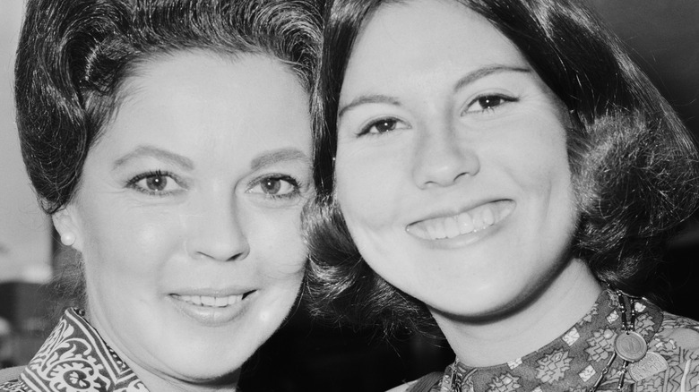 Shirley Temple and daughter smiling 