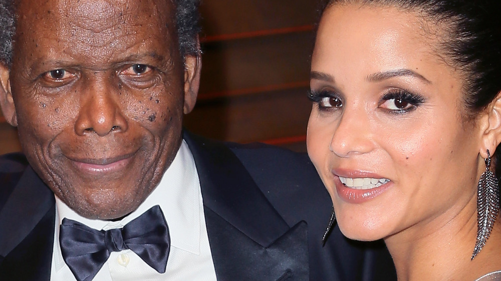 Sidney Poitier hugs daughter