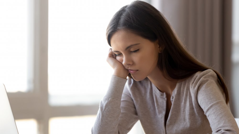 woman asleep at her desk