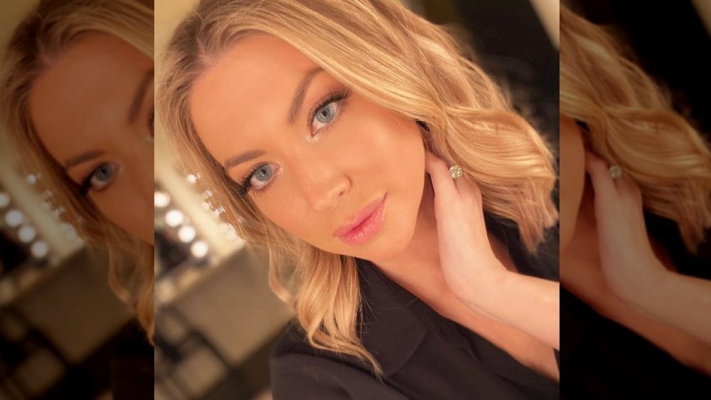 Stassi Schroeder showing off her engagement ring