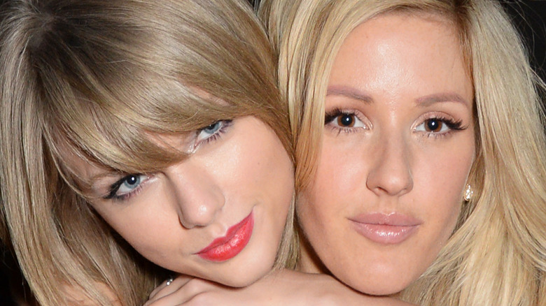 Taylor Swift and Ellie Goulding embracing