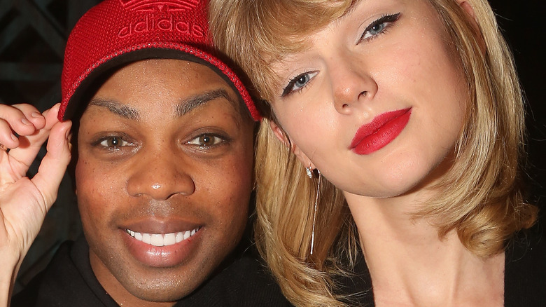 Taylor Swift and Todrick Hall posing 