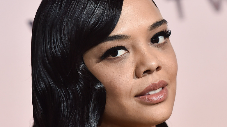 Tessa Thompson poses on the red carpet