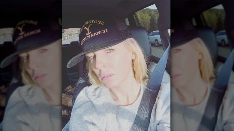 Kelly Reilly taking selfie in car
