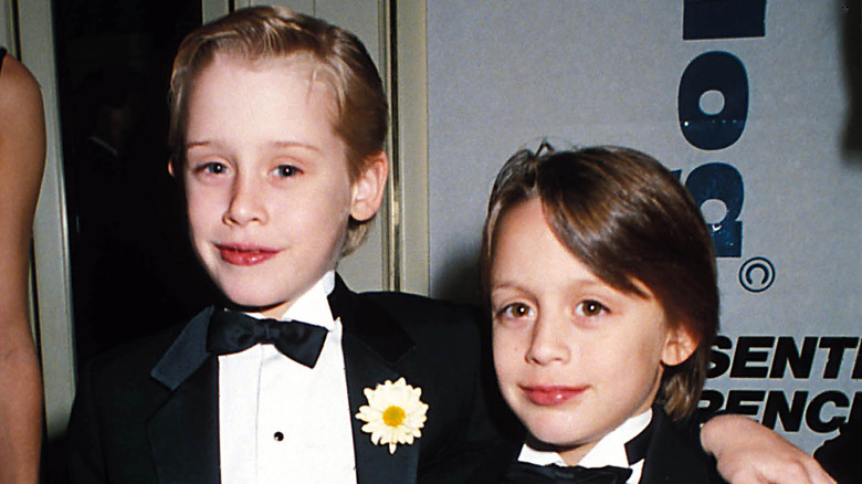 Macaulay and Kieran Culkin smiling as kids