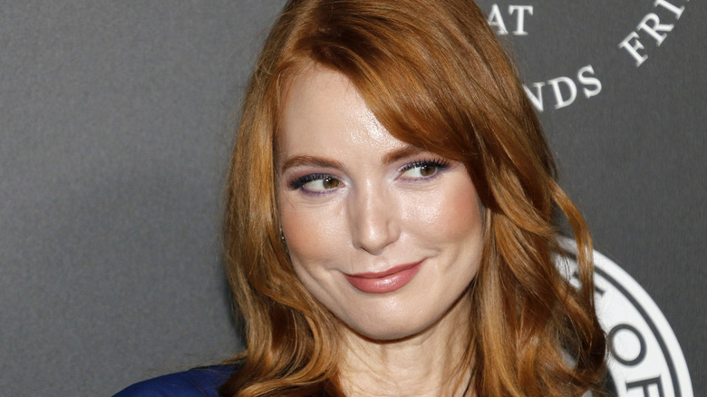 Alicia Witt with a cute smirk