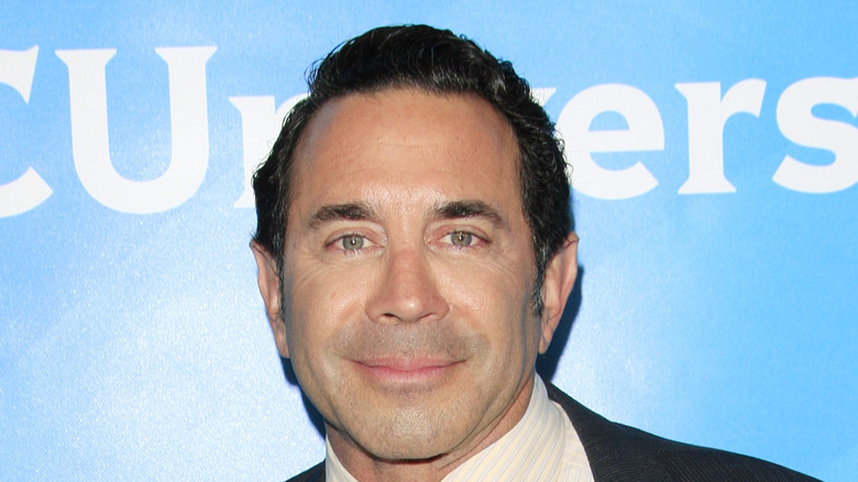 Dr. Paul Nassif poses at an event