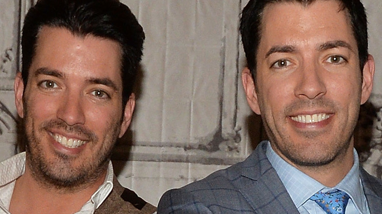 Property Brothers pose back-to-back