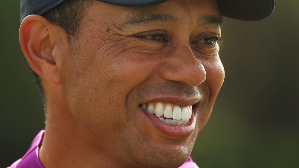 Tiger Woods smiling outside