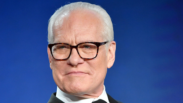 Tim Gunn looking to his right