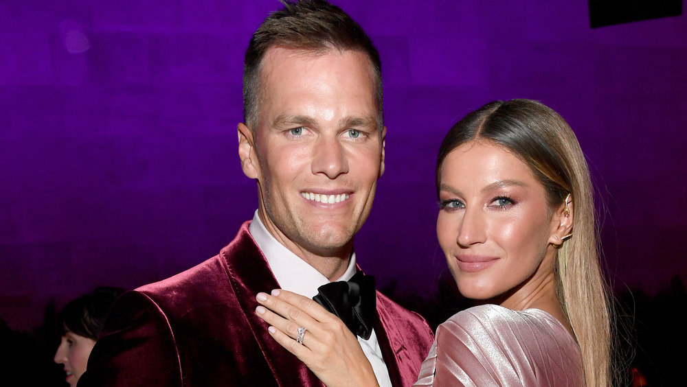 Tim Brady and Gisele Bündchen posing