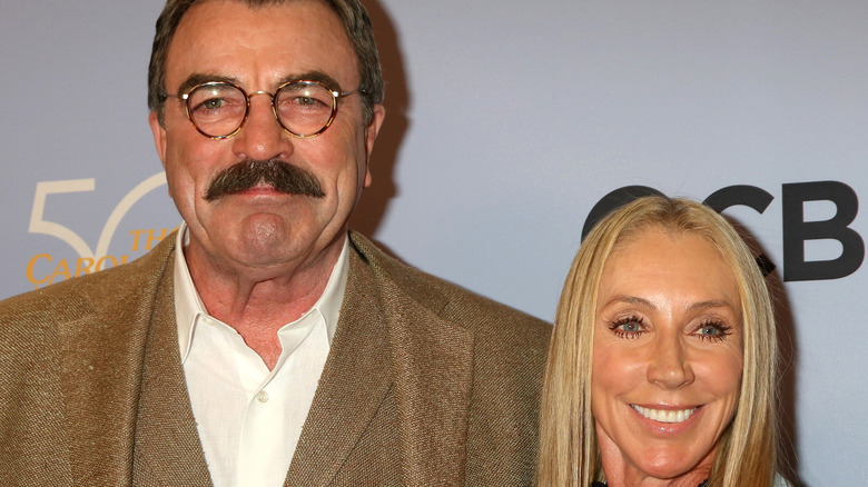 Tom Selleck and Jillie Mack attending an event