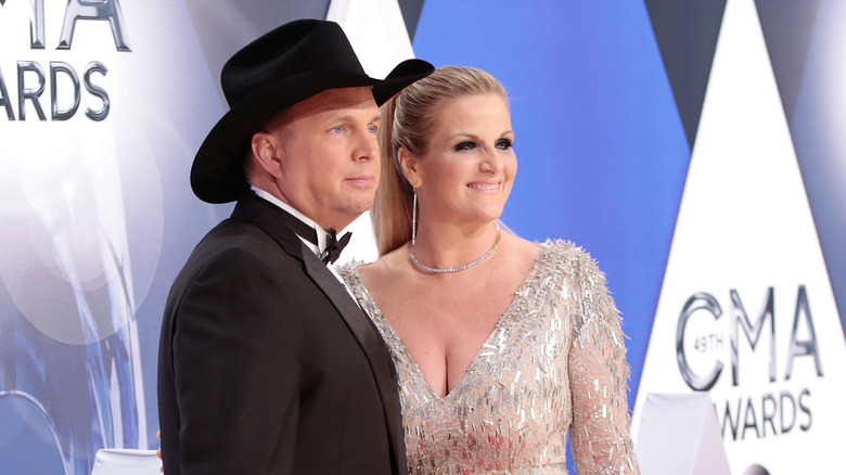 Garth Brooks and Trisha Yearwood attend the 49th annual CMA Awards in 2015