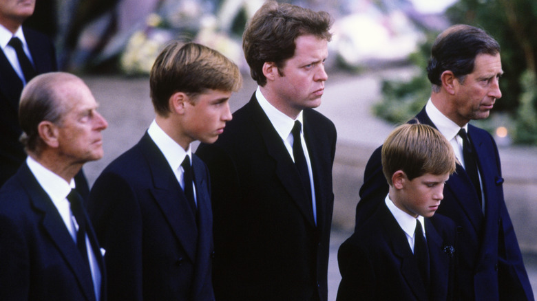 Prince Philip, Prince William, Earl Spencer, Prince Harry, and King Charles walking