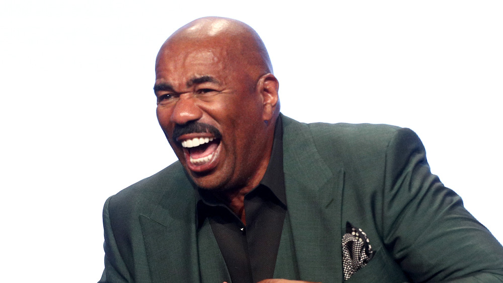 Steve Harvey smiling onstage