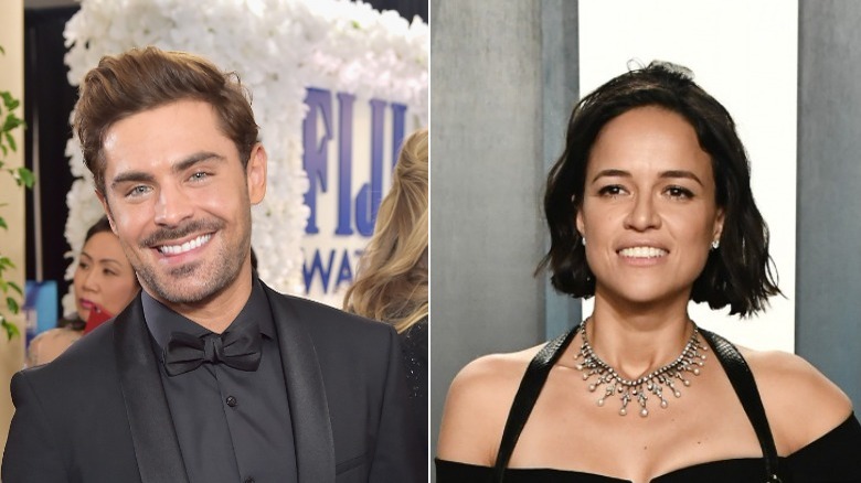 Zac Efron and Michelle Rodriguez smile on the red carpet