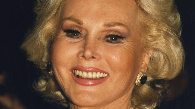 Zsa Zsa Gabor smiling on red carpet