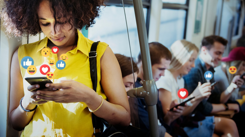 woman on phone on subway