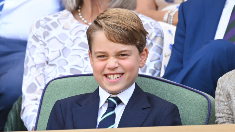 Prince George smiling at The Wimbledon Men's Singles Final.