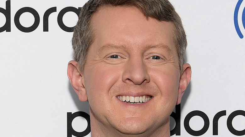 Ken Jennings smiles at an event