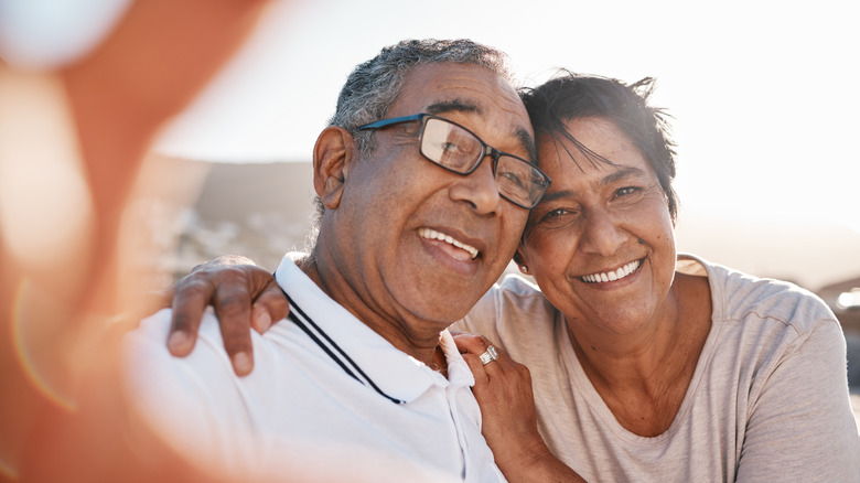 Older couple takes a selfie