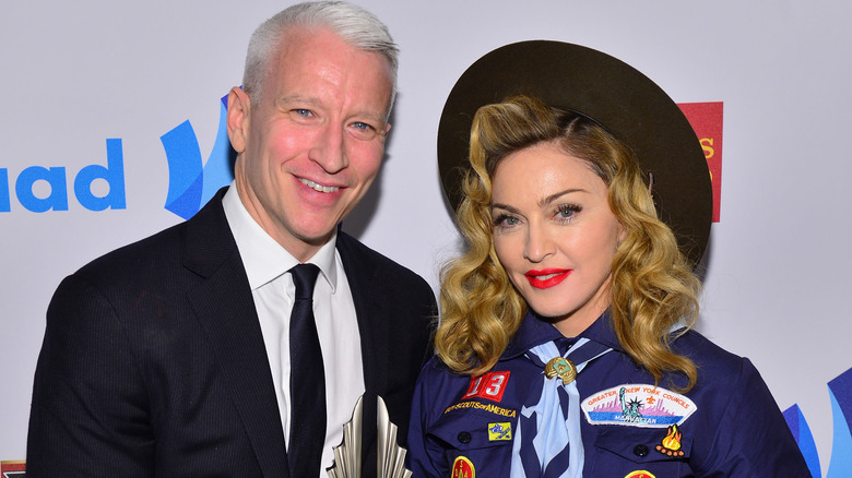 Anderson Cooper and Madonna smiling