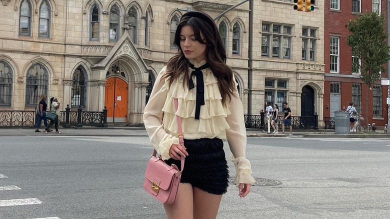 woman posing in lace shorts