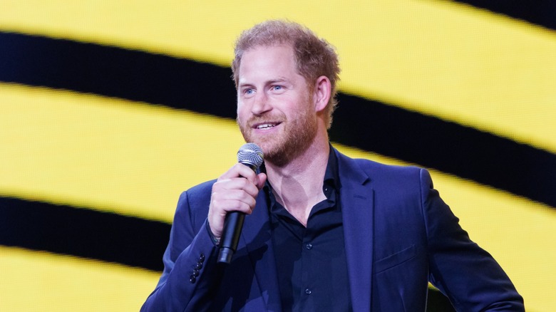 Prince Harry speaking with microphone