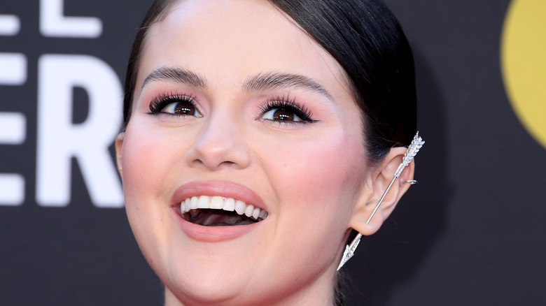 Selena Gomez smiling on red carpet of 27th Annual Critics Choice Awards
