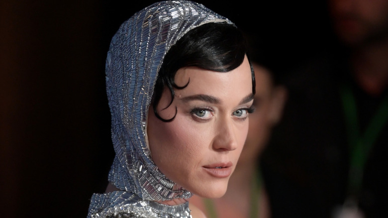Katy Perry wearing a silver hood