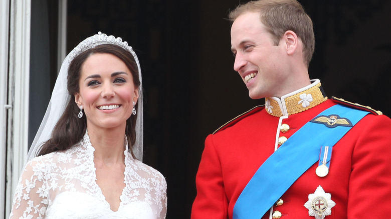 Prince William smiles at Kate Middleton on their wedding day