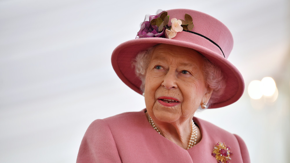 Queen Elizabeth II in pink hat and suit