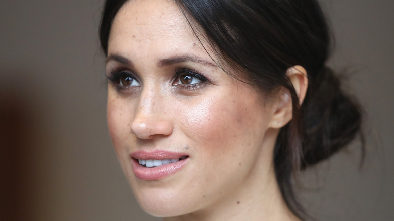 Meghan Markle looks pensive